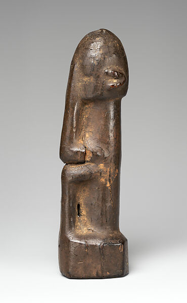 Seated Figure (Dyongou Serou), Dogon blacksmith, Wood, sacrificial materials, Dogon peoples