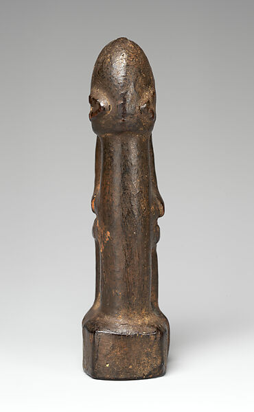 Seated Figure (Dyongou Serou), Dogon blacksmith, Wood, sacrificial materials, Dogon peoples