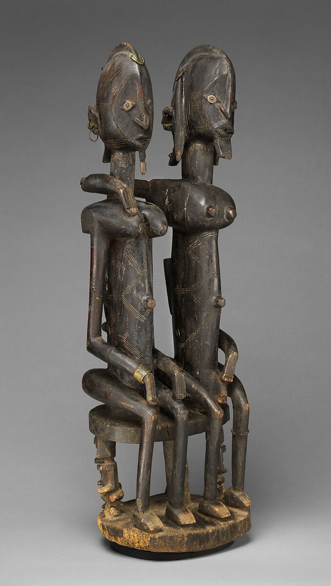 Seated couple, "Barnes Foundation Master" (active late 18th–early 19th century[?], Bandiagara Escarpment, Mali), Wood, copper and iron alloy, applied organic materials, Dogon peoples