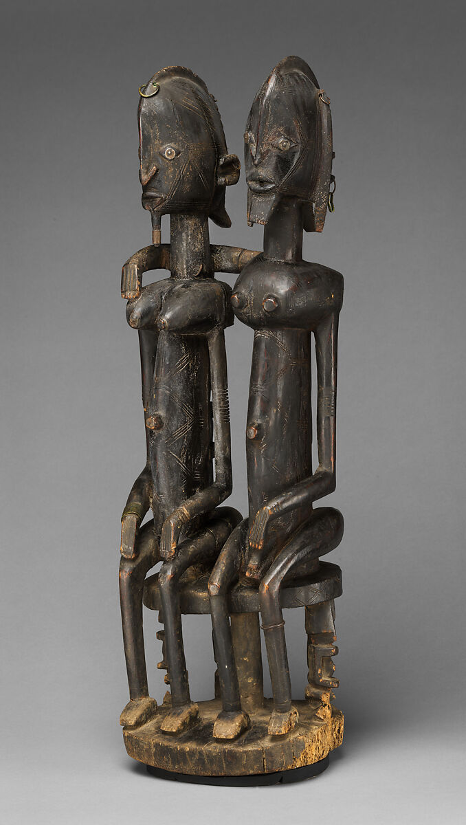 Seated couple, "Barnes Foundation Master" (active late 18th–early 19th century[?], Bandiagara Escarpment, Mali), Wood, copper and iron alloy, applied organic materials, Dogon peoples
