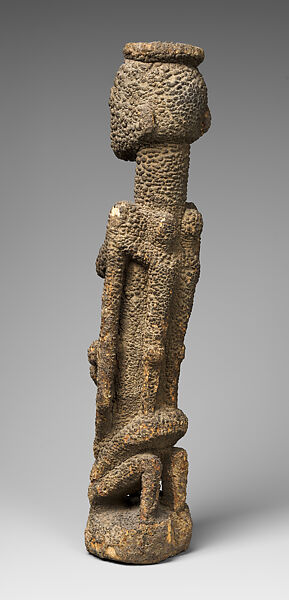 Kneeling female figure with three children, Tellem or Dogon blacksmith, Wood, applied organic materials, Dogon or Tellem  peoples (?)