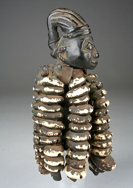 Figure: Female (Ogo Elegba), Wood, leather, cowries, Yoruba peoples 