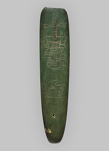 Modified celt-pendant with incised motifs
