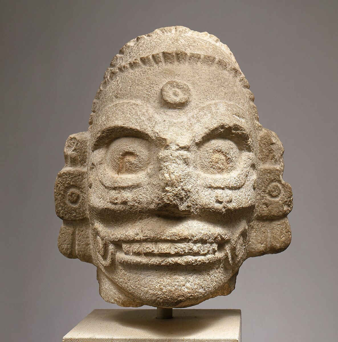 Head of a Rain God, Fossiliferous limestone, Maya 