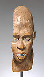 Ikem helmet mask fragment, Southern Igbo, Ibibio, or Anaang artist, Wood, pigment, plant fiber remnants, Ibibio or Igbo peoples, Ozu Item group (?)