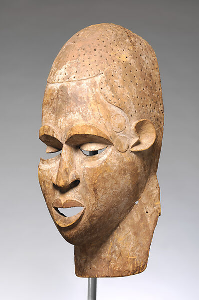 Ikem helmet mask fragment, Southern Igbo, Ibibio, or Anaang artist, Wood, pigment, plant fiber remnants, Ibibio or Igbo peoples, Ozu Item group (?) 