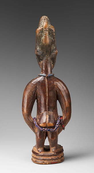 Twin Figure: Female (Ibeji), Workshop of Ibuke Compound, Wood, camwood powder, beads, Oyo-Yoruba peoples