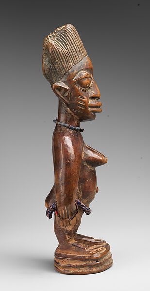 Twin Figure: Female (Ibeji), Workshop of Ibuke Compound, Wood, camwood powder, beads, Oyo-Yoruba peoples