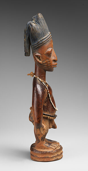 Twin Figure: Male (Ibeji), Workshop of Ibuke Compound, Wood, camwood powder, indigo, beads, iron, vertebrae, Oyo-Yoruba peoples