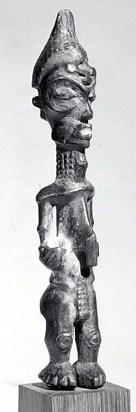 Figure: Male Holding Vessel, Wood, pigment, camwood powder, Luluwa peoples