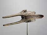 Kòmòkun or kònòkun (head of Kòmò or Kònò) helmet mask, Bamana or Senufo blacksmith, Wood, cloth, fiber, applied organic materials, Bamana peoples