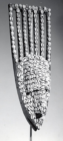 Ntomo Mask, Bamana numu (blacksmith), Wood, cowrie shells, seeds, latex or resin, Bamana peoples