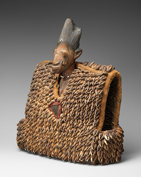 Twin Figure: Male with Garment (Ewu ileke Ibeji), Yoruba artist, Wood, cowrie shells, cloth, glass beads, pigment, iron, tukula powder, Yoruba peoples