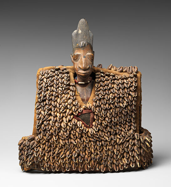 Twin Figure: Male with Garment (Ewu ileke Ibeji), Wood, cowrie shells, cloth, glass beads, pigment, iron, tukula powder, Yoruba peoples 