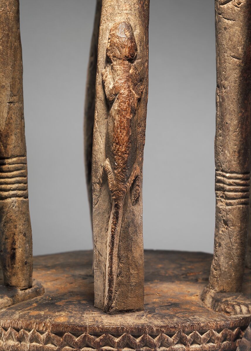 Seated binukedine ( priest), Dogon blacksmith, Wood, iron, Dogon peoples