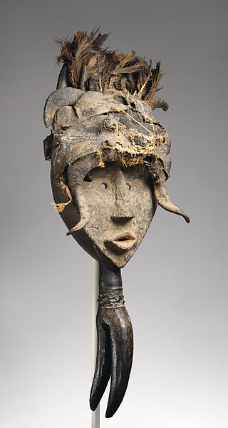 Koma su face mask, Mau artist(s) and ritual specialist(s), Wood, clay, vulture(?) feathers, horn, cotton, vegetable fiber, applied organic materials, Mau peoples