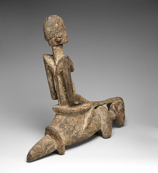 Figure riding a quadruped, Dogon or Tellem blacksmith (?), Wood (Burseraceae family), applied organic materials, Dogon or Tellem  peoples (?)