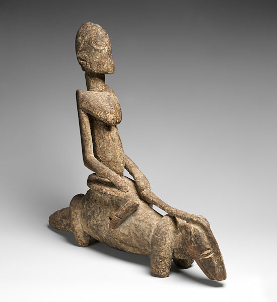 Figure riding a quadruped, Dogon or Tellem blacksmith (?), Wood (Burseraceae family), applied organic materials, Dogon or Tellem  peoples (?)