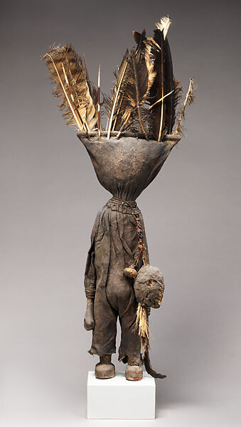 Kafigeledjo (oracle figure), Senufo artist, Wood, iron, bone, porcupine quills, feathers, commercially woven fiber, applied organic materials, Senufo peoples