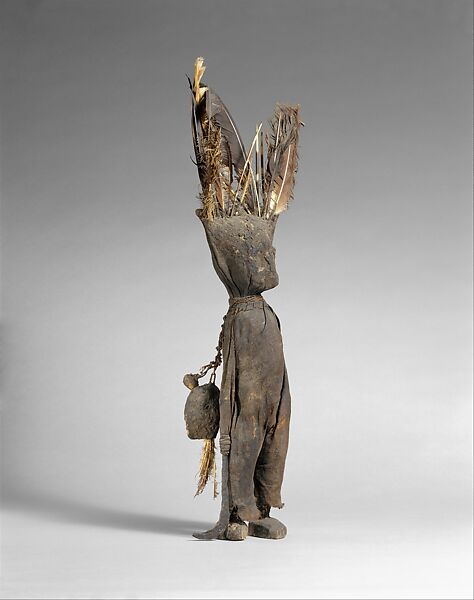 Kafigeledjo (oracle figure), Senufo artist, Wood, iron, bone, porcupine quills, feathers, commercially woven fiber, applied organic materials, Senufo peoples