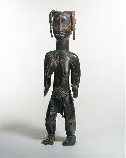 Female Figure (Lü Me), Zlan of Belewale (ca. 1885, Gengwebe, Côte d’Ivoire – ca. 1955, Liberia), Wood, fiber, pigment, cloth, metal 