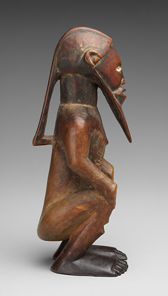 Seated ancestor figure, Bembe-Kongo artist, Wood, ivory, Kongo peoples, Bembe group