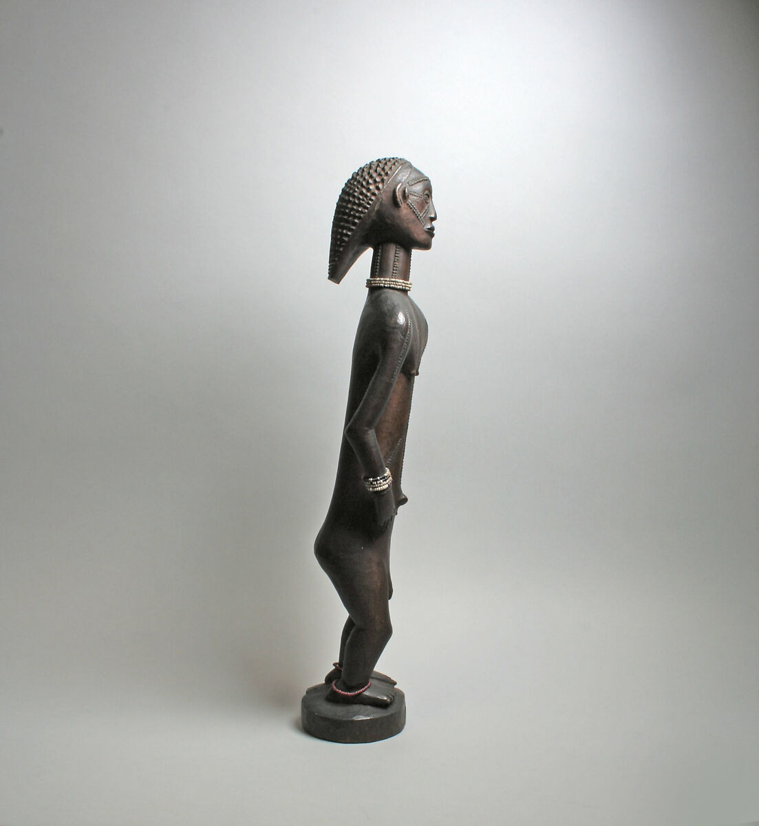 Mukisi Mupasi (ancestor figure), Tabwa artist, Wood, glass beads, cord, Tabwa peoples