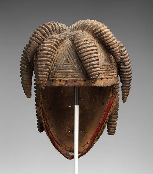 Agbogho mmuo (maiden spirit) face mask, Igbo artist, Wood, pigment, cloth, wire, thread, applied organic material, Igbo peoples