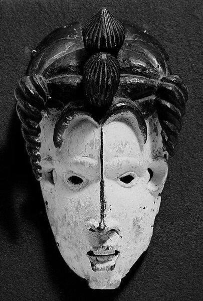 Mask: Female (Mmuo), Wood, kaolin, pigments, Igbo peoples, Isu-Ama group 