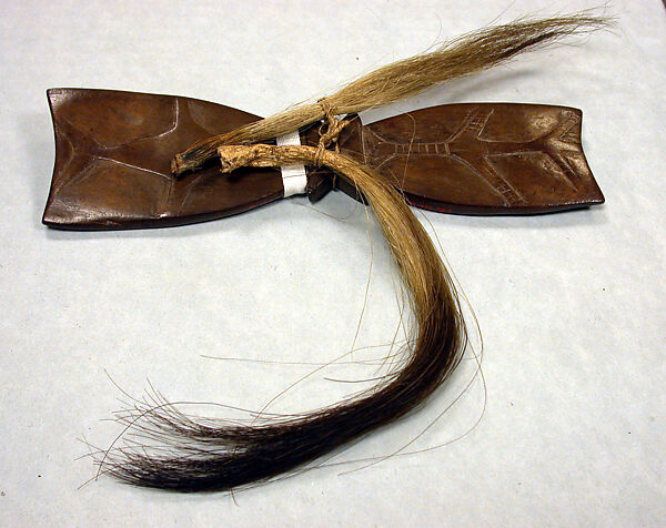 Charm (Nuosalo [?]), Wood, pig's tails, fiber, Santa Cruz Islands 