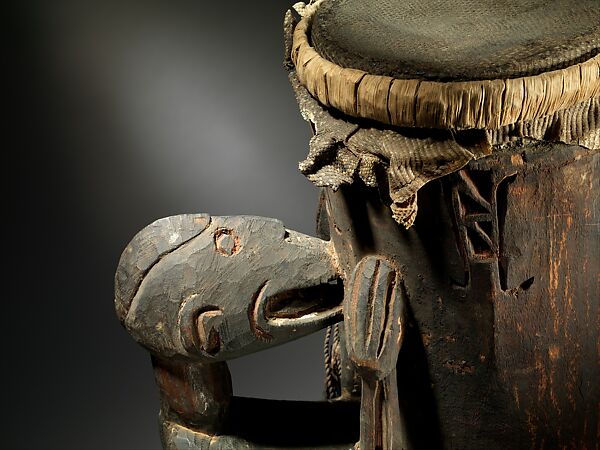 Drum, Chief Omas, wood, lizard skin, beeswax, sago palm leaves, fiber, paint, Asmat people