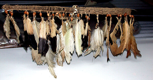 Spear, Wood, cassowary claw, fiber, seeds,feathers, Asmat people