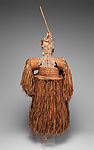 Body mask, Asmat artist, Mulberry fiber, rattan, sago palm leaves, wood, bamboo, cassowary bone, cassowary feathers, feathers, coix seeds, pigment, Asmat people