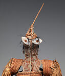 Body mask, Asmat artist, Mulberry fiber, rattan, sago palm leaves, wood, bamboo, cassowary bone, cassowary feathers, feathers, coix seeds, pigment, Asmat people