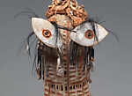 Body mask, Asmat artist, Mulberry fiber, rattan, sago palm leaves, wood, bamboo, cassowary bone, cassowary feathers, feathers, coix seeds, pigment, Asmat people