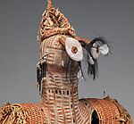Body mask, Asmat artist, Mulberry fiber, rattan, sago palm leaves, wood, bamboo, cassowary bone, cassowary feathers, feathers, coix seeds, pigment, Asmat people