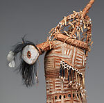 Body mask, Asmat artist, Mulberry fiber, rattan, sago palm leaves, wood, bamboo, cassowary bone, cassowary feathers, feathers, coix seeds, pigment, Asmat people