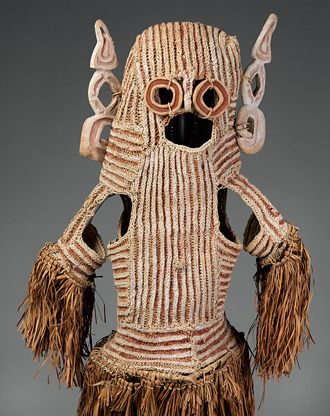 Body mask, Asmat artist(s), Mulberry fiber, rattan, sago palm leaves, wood, pigment, Asmat people