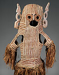 Body mask, Asmat artist, Mulberry fiber, rattan, sago palm leaves, wood, pigment, Asmat people