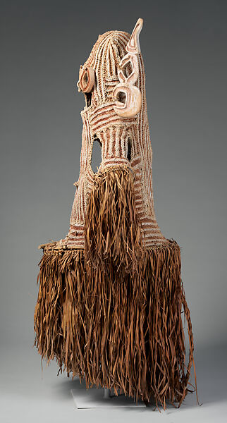 Body mask, Asmat artist(s), Mulberry fiber, rattan, sago palm leaves, wood, pigment, Asmat people