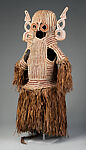 Body mask, Asmat artist, Mulberry fiber, rattan, sago palm leaves, wood, pigment, Asmat people