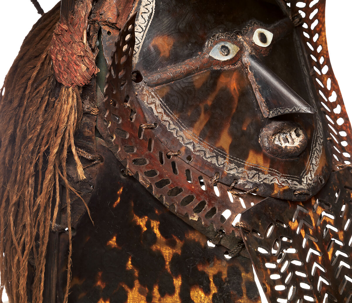 Krar (mask), Mabuiag Island artist, Turtle shell, wood, cassowary feathers, fiber, resin, shell, paint, Torres Strait Islander