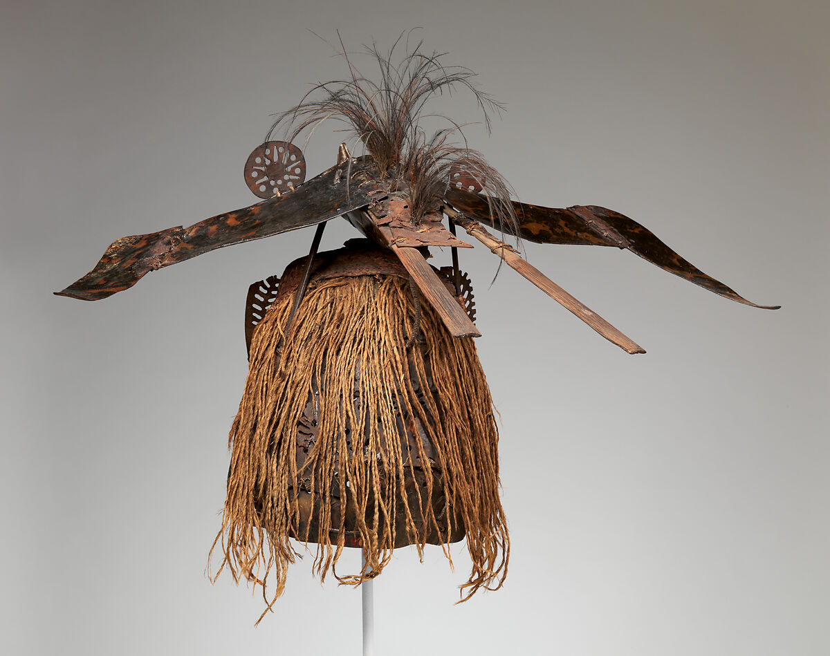 Krar (mask), Mabuiag Island artist, Turtle shell, wood, cassowary feathers, fiber, resin, shell, paint, Torres Strait Islander