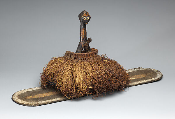 Reliquary Figure, Wood, cane, pigment, raffia, leaves, metal, resin, Kota peoples 