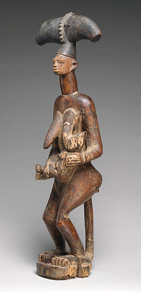 Abiyamo (maternity) figure, Yoruba artist, Wood, pigment, accumulated surface material, Yoruba peoples