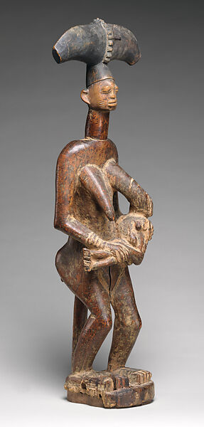 Abiyamo (maternity) figure, Yoruba artist, Wood, pigment, accumulated surface material, Yoruba peoples