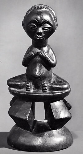 Female Figure: Seated on Stool