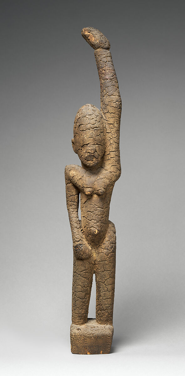 Female figure with raised arm, Tellem blacksmith, Wood (Moraceae family), applied organic materials, Tellem civilization (?)