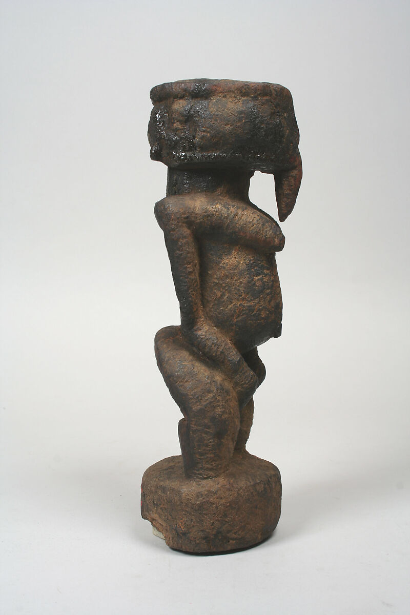 Figure: Female, Wood (Newtonia, Leguminosae wood), sacrificial materials, Dogon or Tellem  peoples (?) 