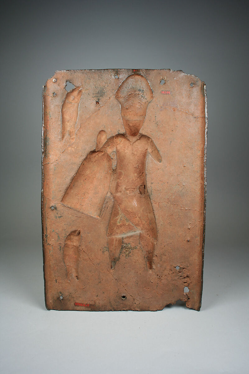 Plaque with Warrior and Fish, Ìgùn Ẹ́rọ̀nwwọ̀n (brass-casting guild) artists, Brass, Edo peoples